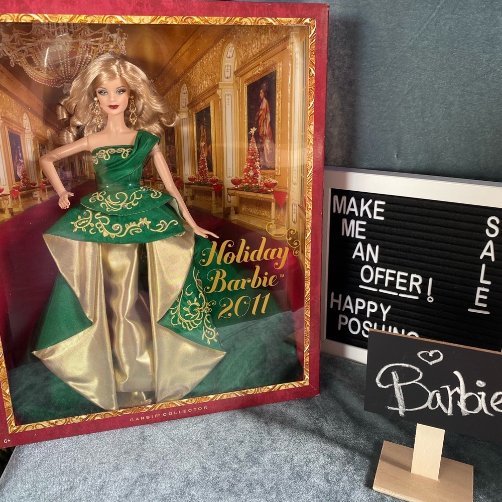 Holiday Barbie 2011.
New in box, never opened, excellent condition.